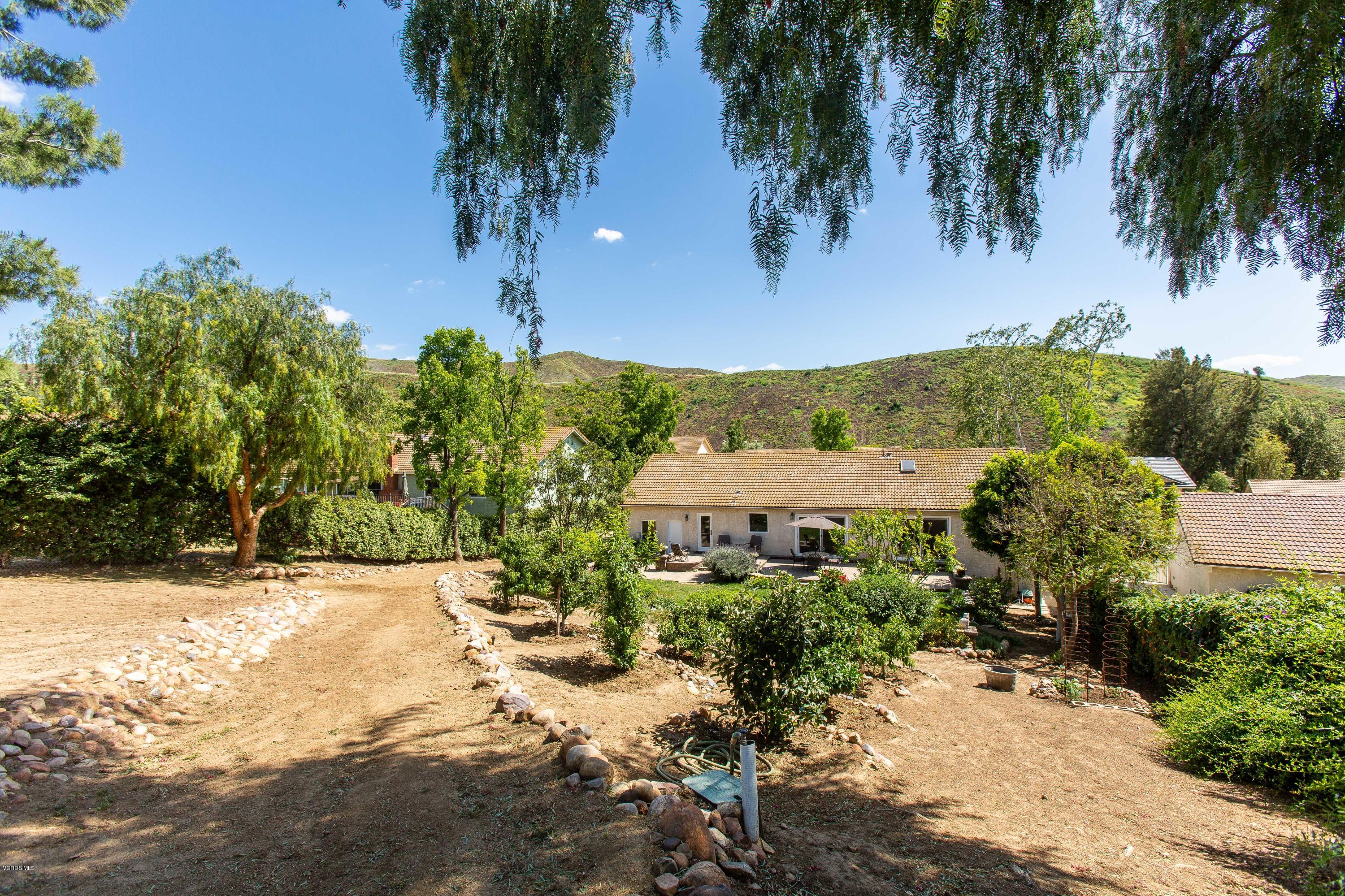 1177 Rambling Road Simi Valley, CA 93065 - Photo 47 of 56 an aerial view of a house with yard and lake view