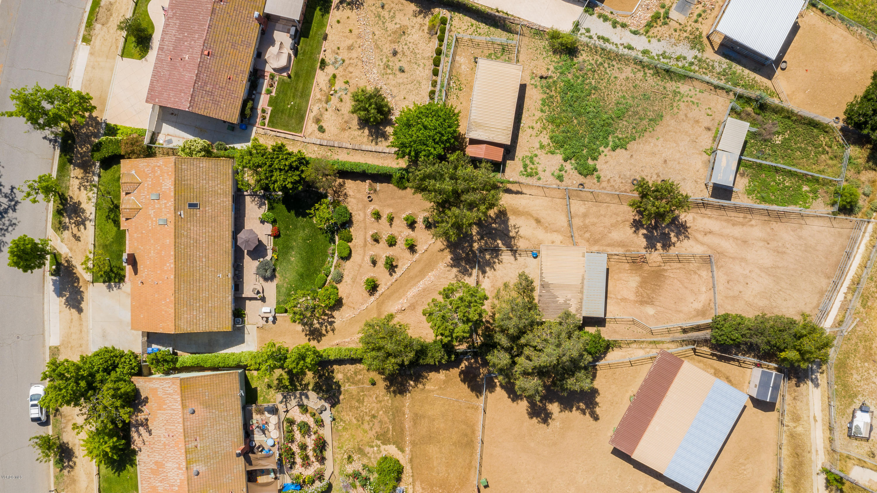 1177 Rambling Road Simi Valley, CA 93065 - Photo 53 of 56 an aerial view of a house with a yard and garden