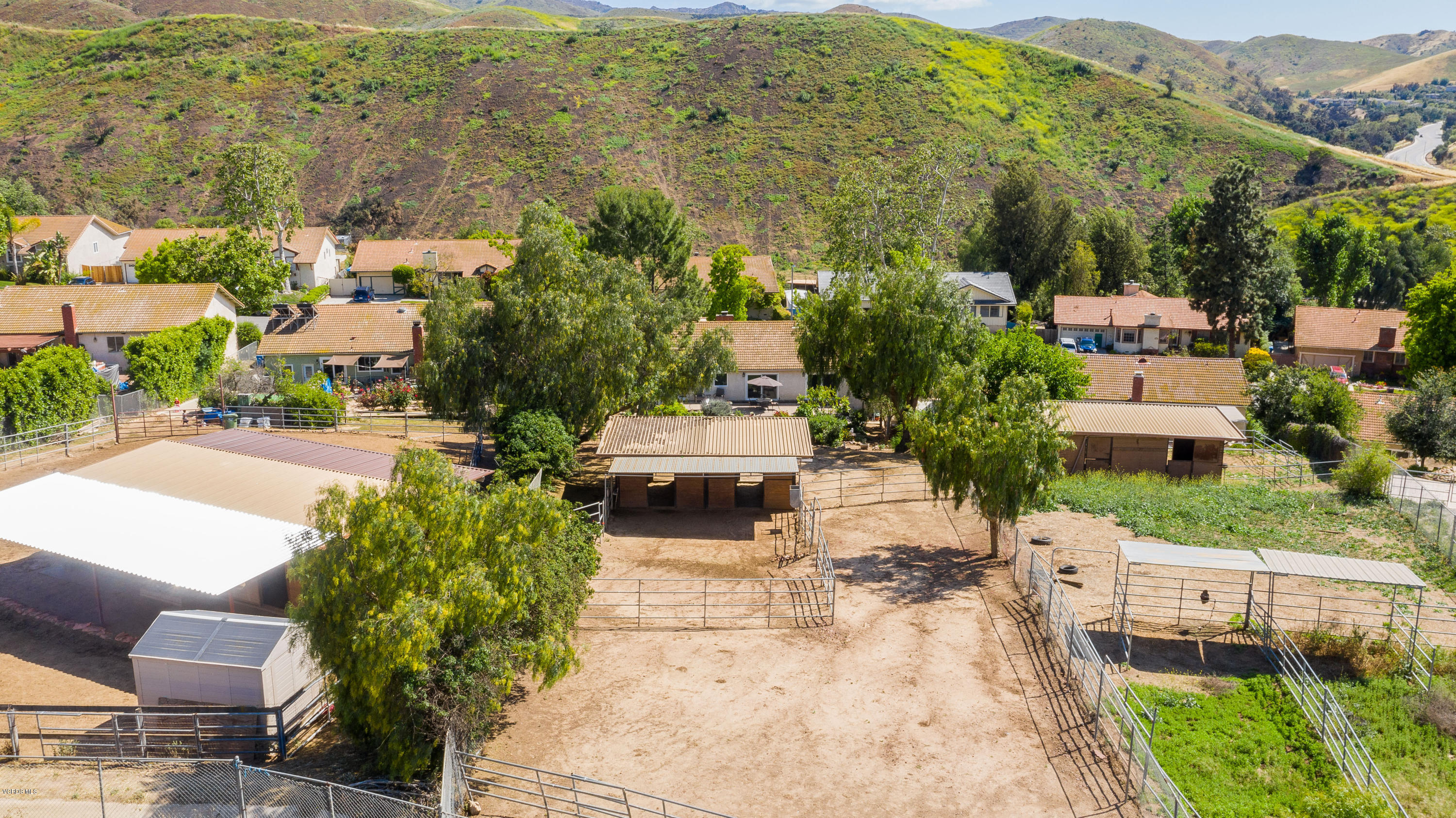 1177 Rambling Road Simi Valley, CA 93065 - Photo 54 of 56 an aerial view of a house with a yard and lake view