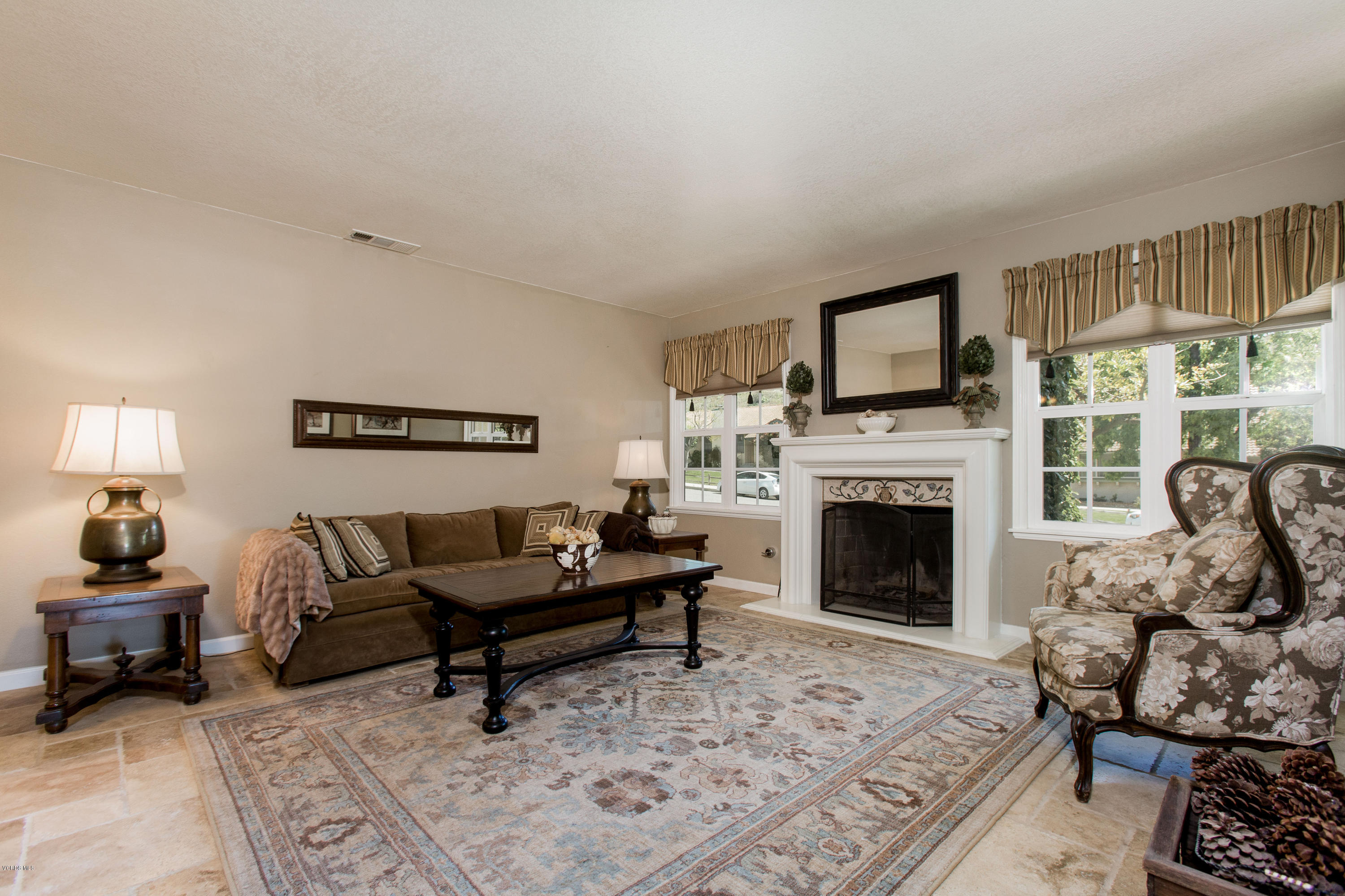 1177 Rambling Road Simi Valley, CA 93065 - Photo 7 of 56 a living room with furniture and a fireplace
