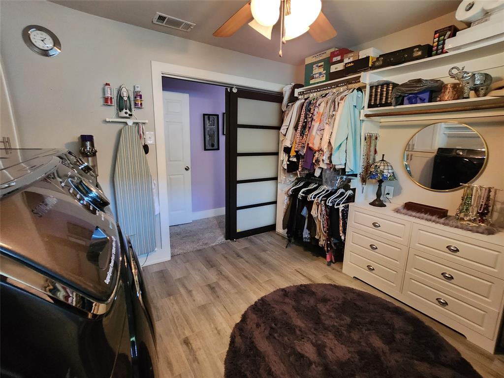 1023 Ridgefield Drive Plano, TX 75075 - Photo 26 of 39 a bed room with a bed and a television