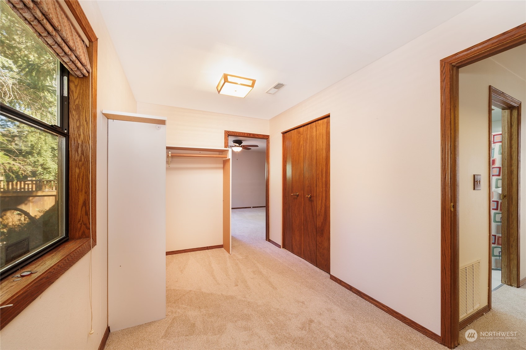 3225 Southeast 7th Street Renton, WA 98057 - Photo 12 of 26 a view of hallway with a large window