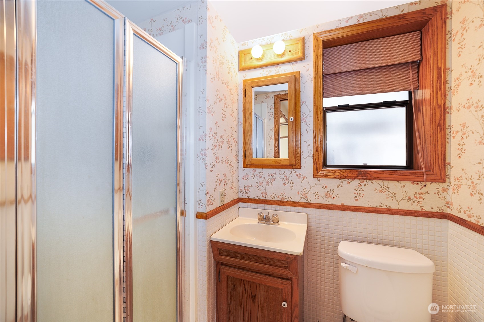 3225 Southeast 7th Street Renton, WA 98057 - Photo 14 of 26 a bathroom with a sink and a toilet