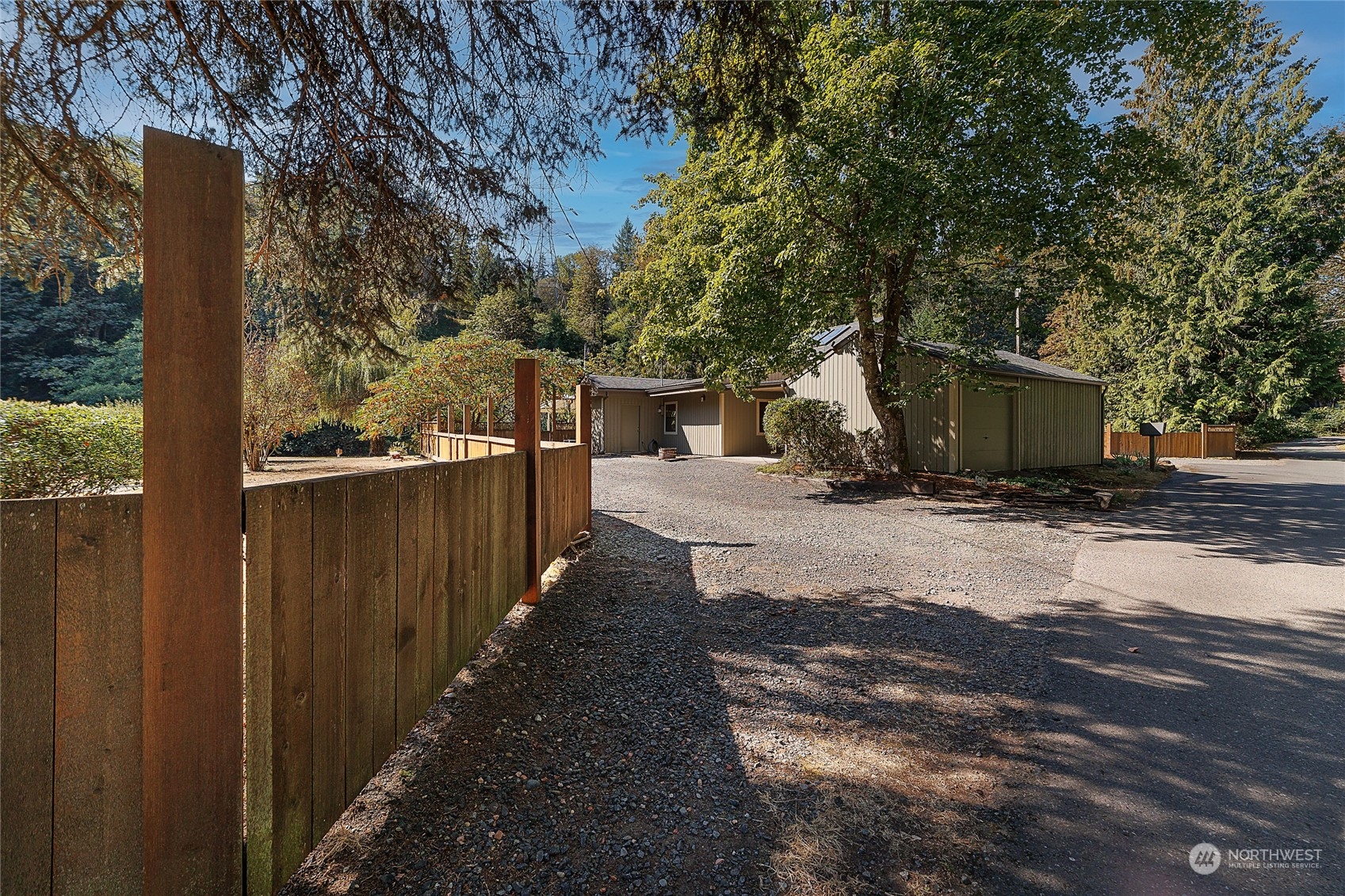 3225 Southeast 7th Street Renton, WA 98057 - Photo 16 of 26 a view of a backyard with sitting area