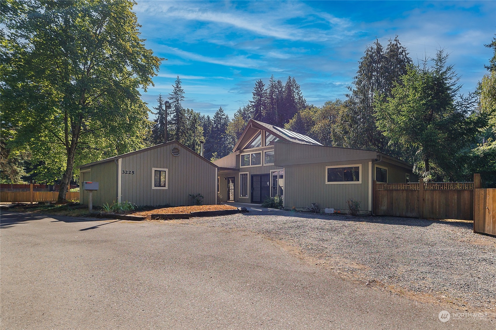 3225 Southeast 7th Street Renton, WA 98057 - Photo 2 of 26 a view of a house with a yard