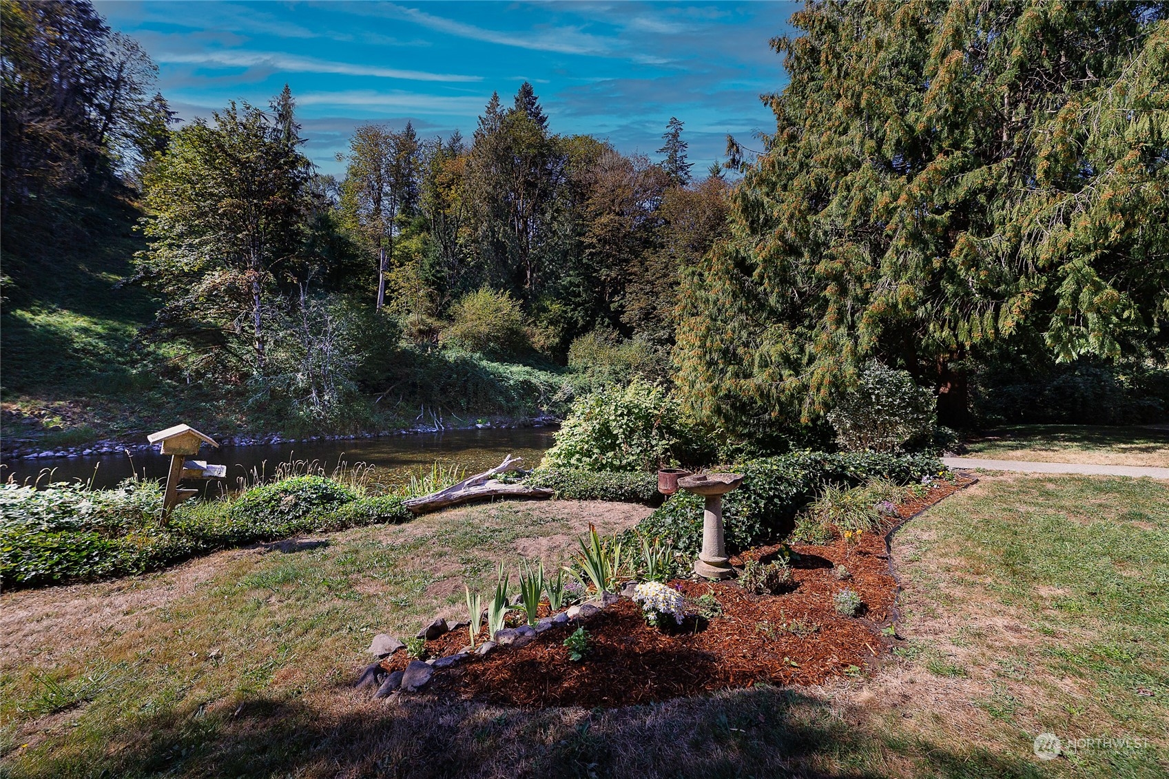 3225 Southeast 7th Street Renton, WA 98057 - Photo 25 of 26 a view of a park with large trees