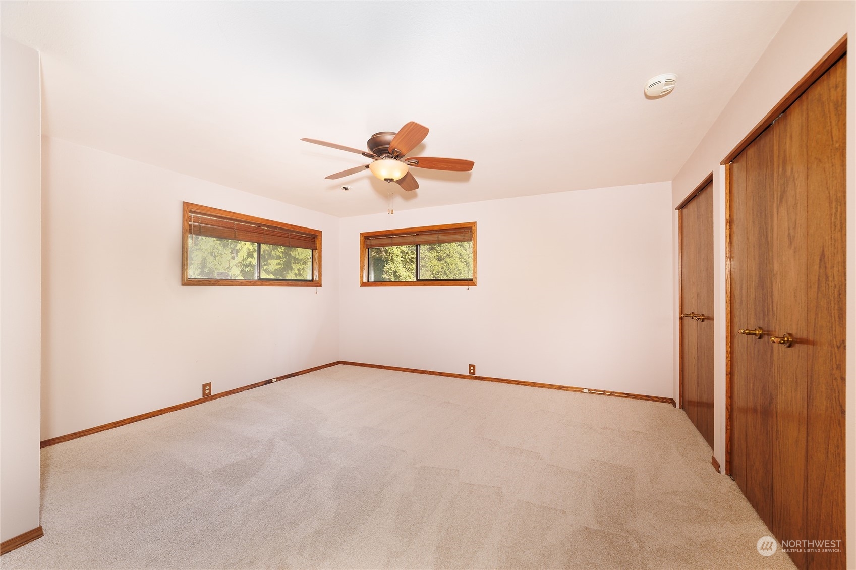3225 Southeast 7th Street Renton, WA 98057 - Photo 10 of 26 an empty room with a window