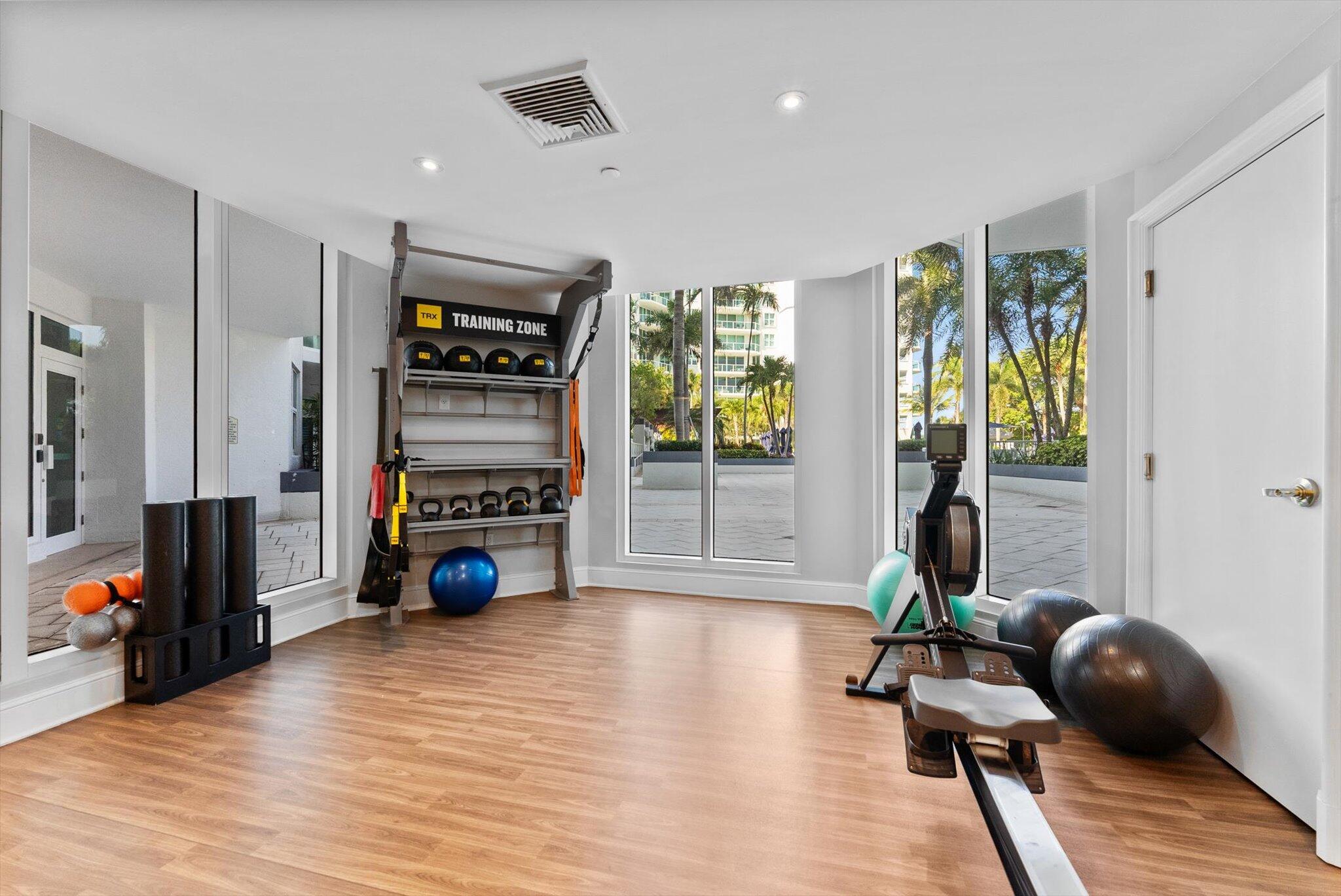 550 Southeast Mizner Boulevard, Unit B206 Boca Raton, FL 33432 - Photo 47 of 65 a view of a livingroom with furniture and a flat screen tv