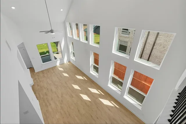 a view of living room with furniture and a flat screen tv