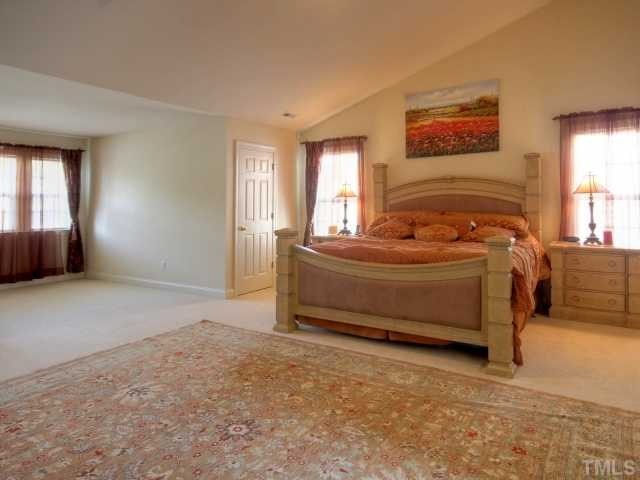 2117 Roland Glen Road Cary, NC 27519 - Photo 15 of 25 This master bedroom is amazing. You have vaulted ceilings, a sitting room, walk in closet and master bath. The room is also wired for plasma TV. Master Bedroom