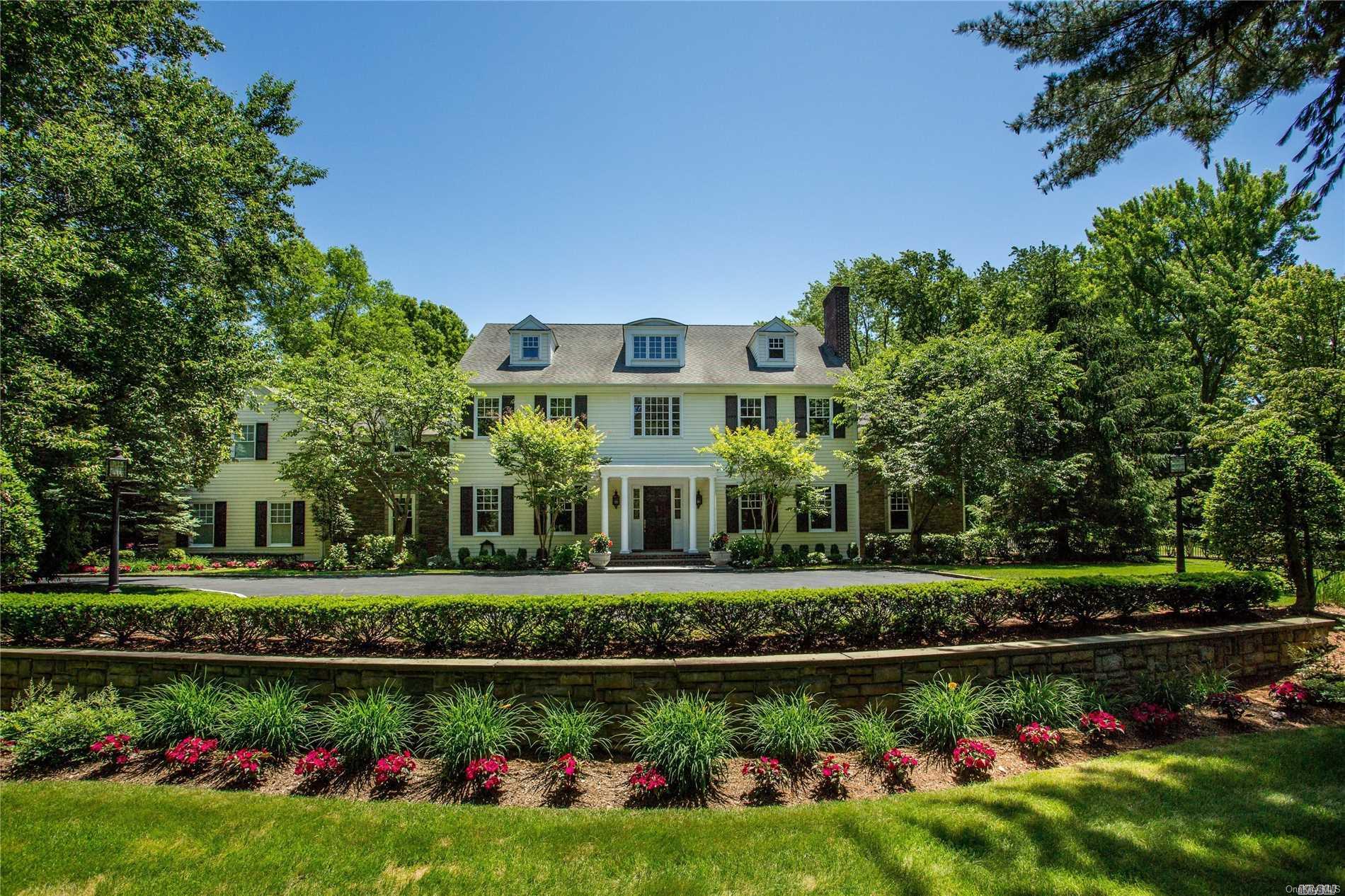 Colorful Gardens Surround this Classic Colonial
