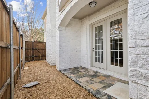 a view of backyard with seating space