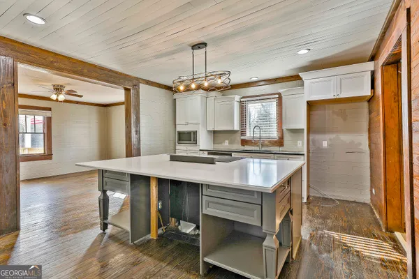 a view of a brick house with a wooden door