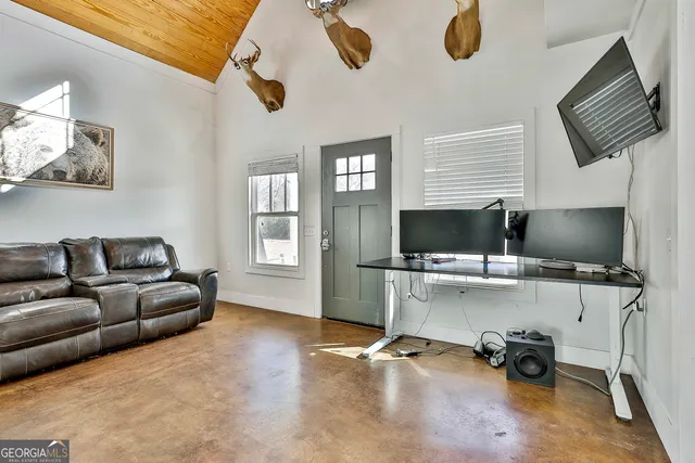 a view of entryway with wooden floor