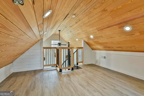 a view of entryway with wooden floor