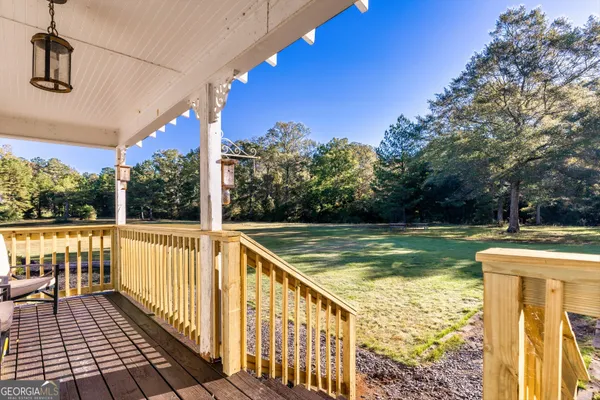 a view of a swimming pool with a patio