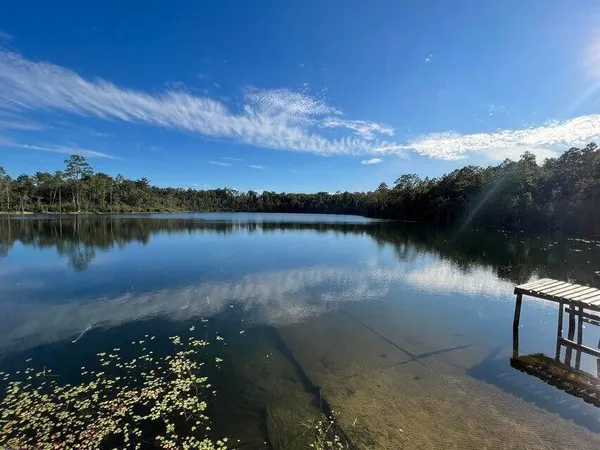 a view of a lake with outdoor space