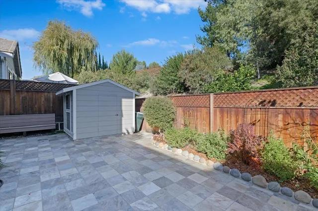 a view of backyard with green space