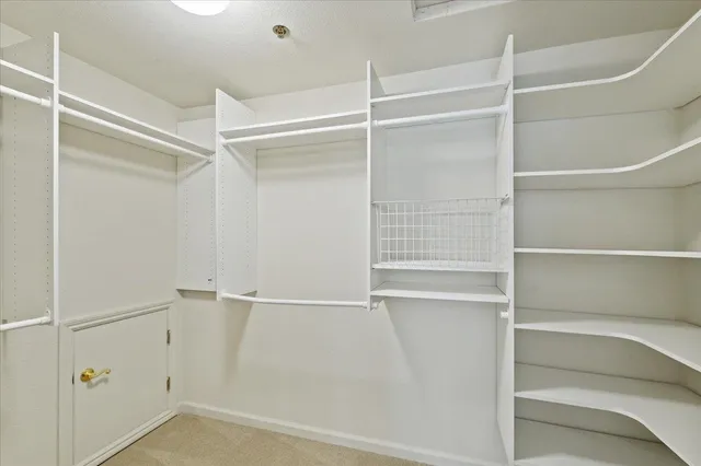a view of a balcony with wooden floor