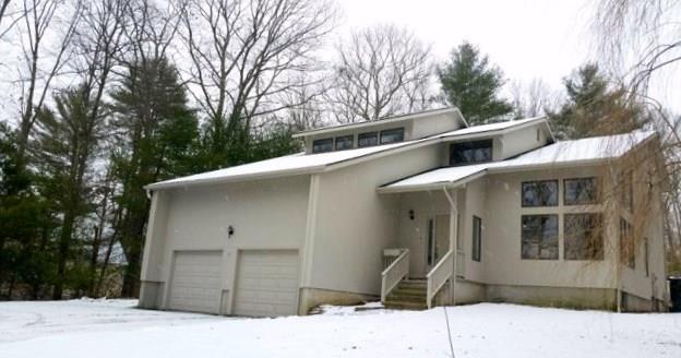 216 Iron Street Ledyard, CT 06339 - Photo 1 of 1 a front view of a house with a yard
