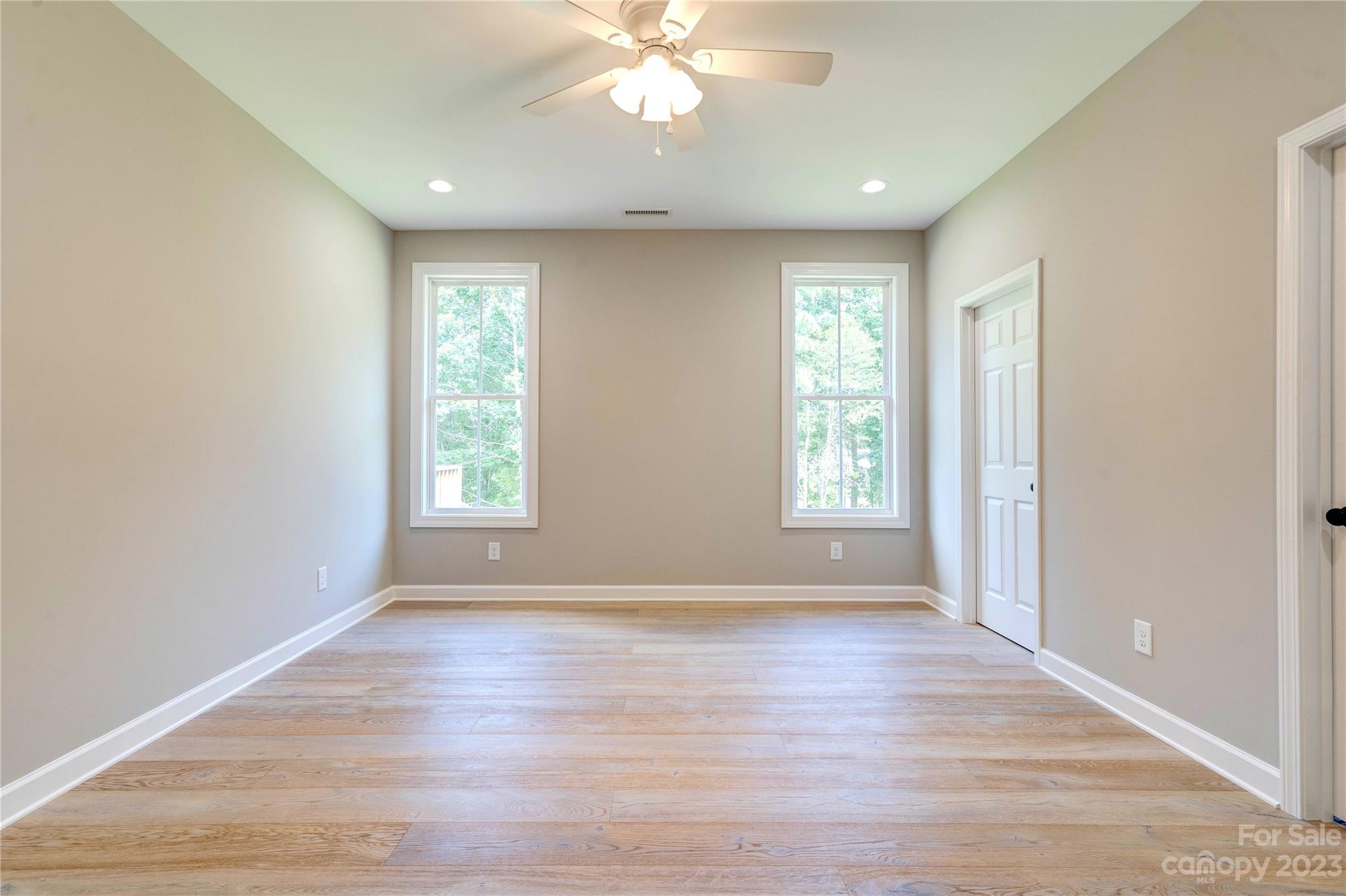 4326 Boulder Drive Morganton, NC 28655 - Photo 17 of 46 a view of an empty room with wooden floor and a window