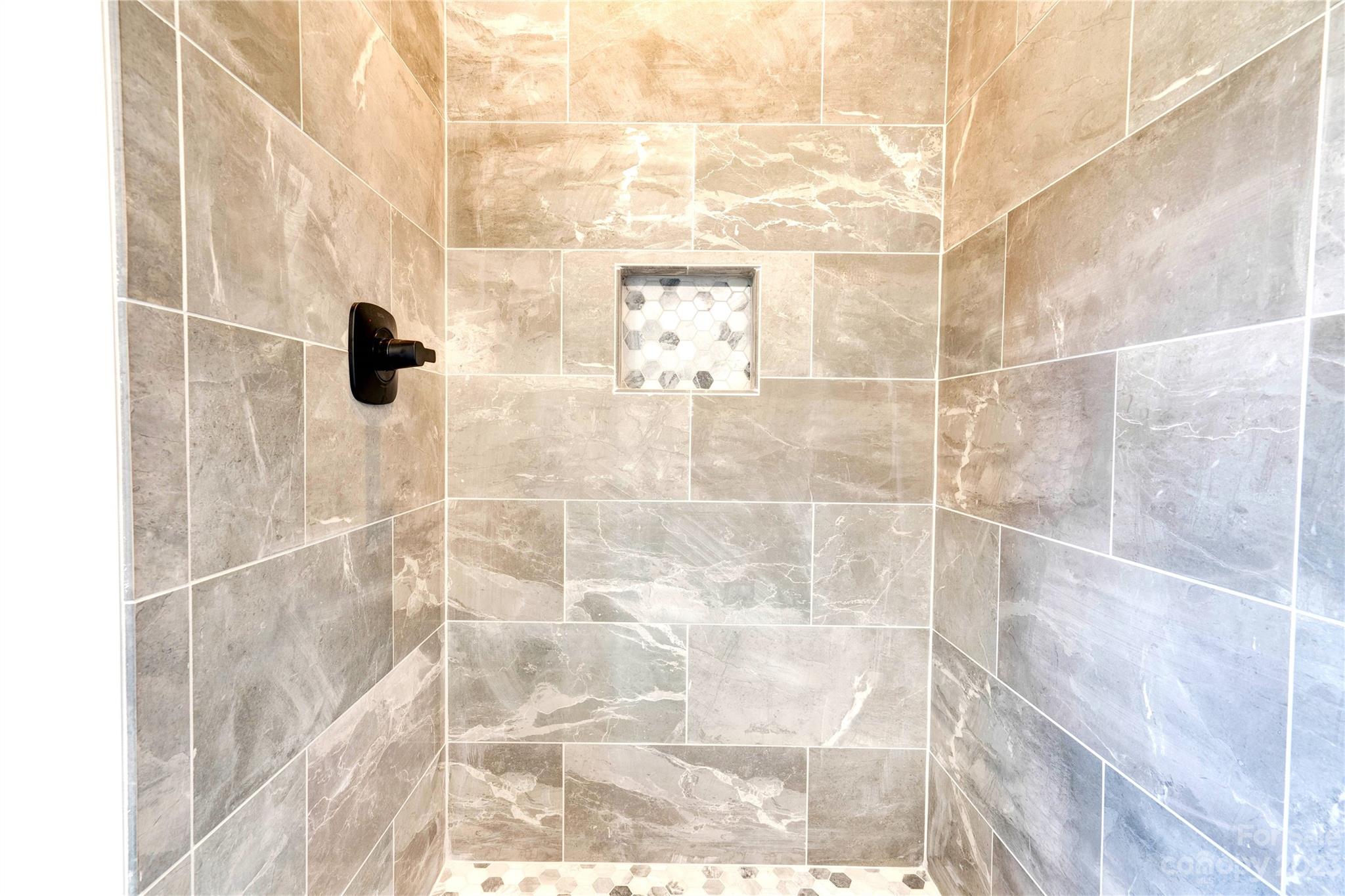 4326 Boulder Drive Morganton, NC 28655 - Photo 22 of 46 a bathroom with a shower