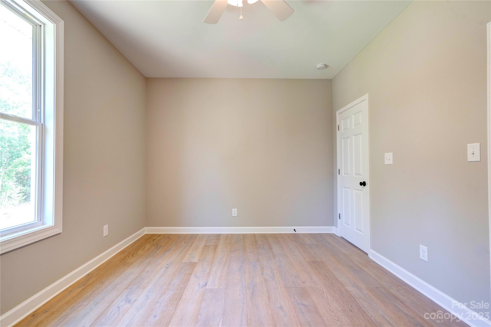 4326 Boulder Drive Morganton, NC 28655 - Photo 30 of 46 a view of a room with wooden floor and windows