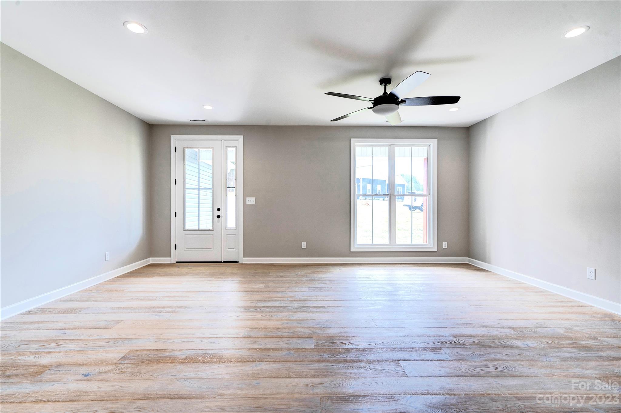 4326 Boulder Drive Morganton, NC 28655 - Photo 4 of 46 wooden floor in an empty room with a window