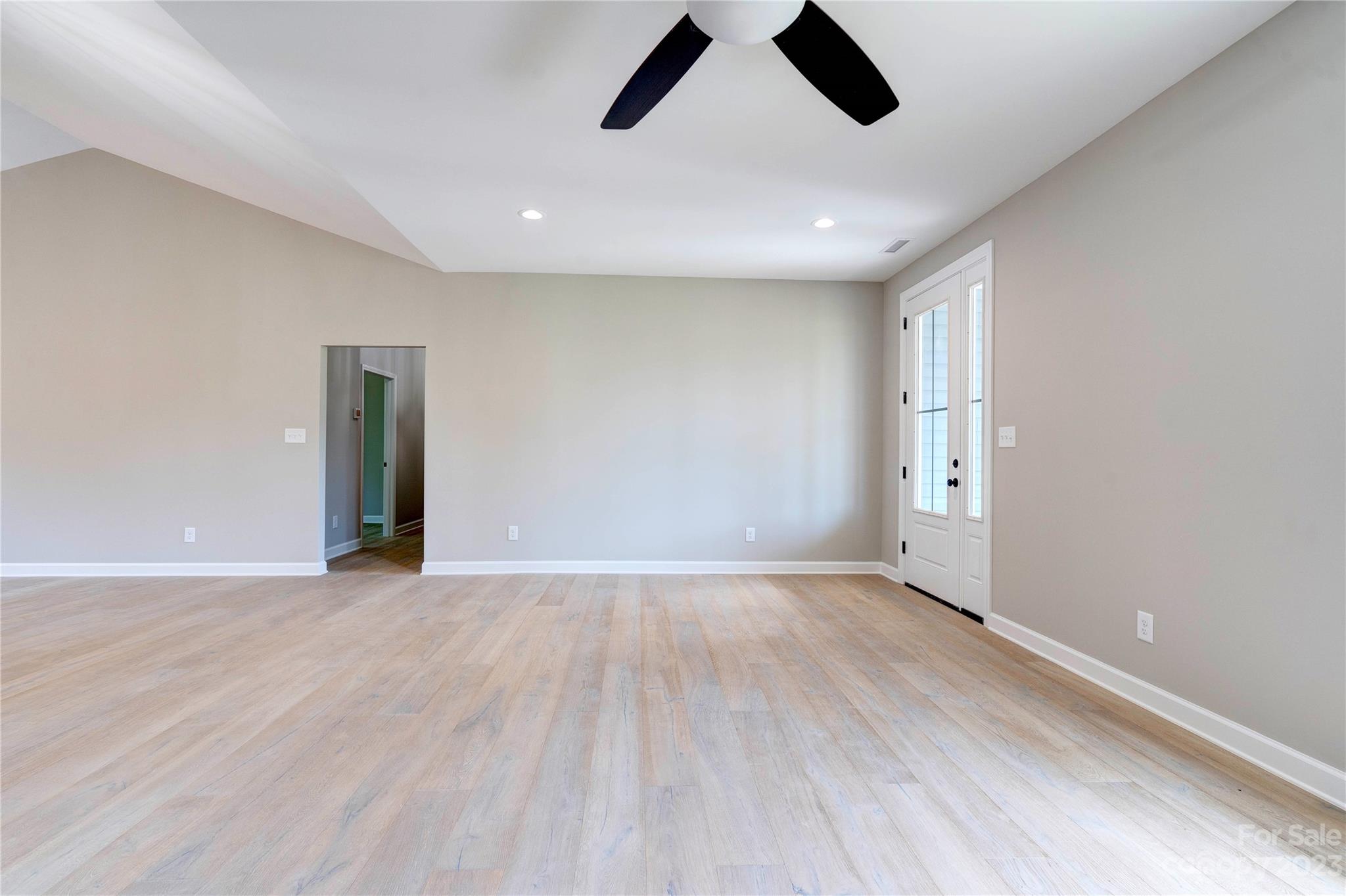 4326 Boulder Drive Morganton, NC 28655 - Photo 6 of 46 an empty room with wooden floor and windows