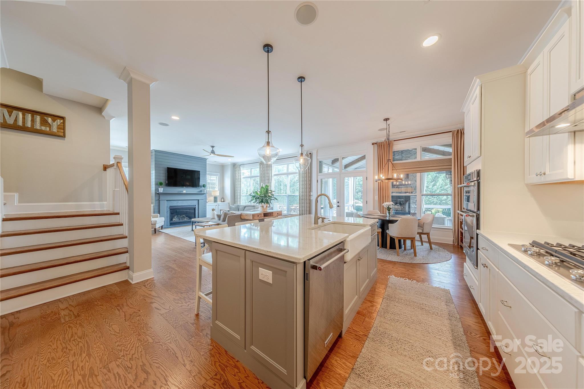 5256 Meadowcroft Way Fort Mill, SC 29708 - Photo 12 of 48 a open kitchen with stainless steel appliances granite countertop a stove and cabinets