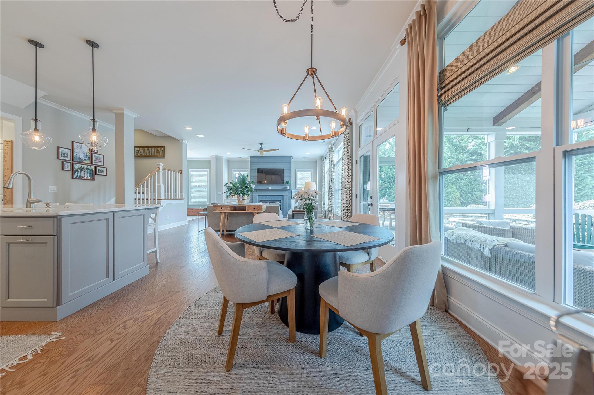 5256 Meadowcroft Way Fort Mill, SC 29708 - Photo 15 of 48 a view of a dining room with furniture window and wooden floor