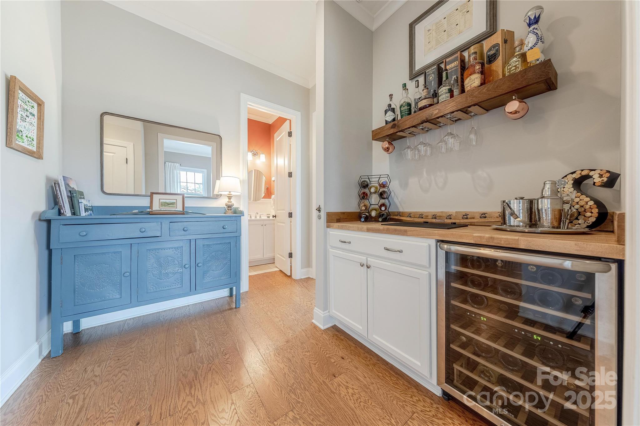 5256 Meadowcroft Way Fort Mill, SC 29708 - Photo 17 of 48 a kitchen with a sink cabinets and wooden floor