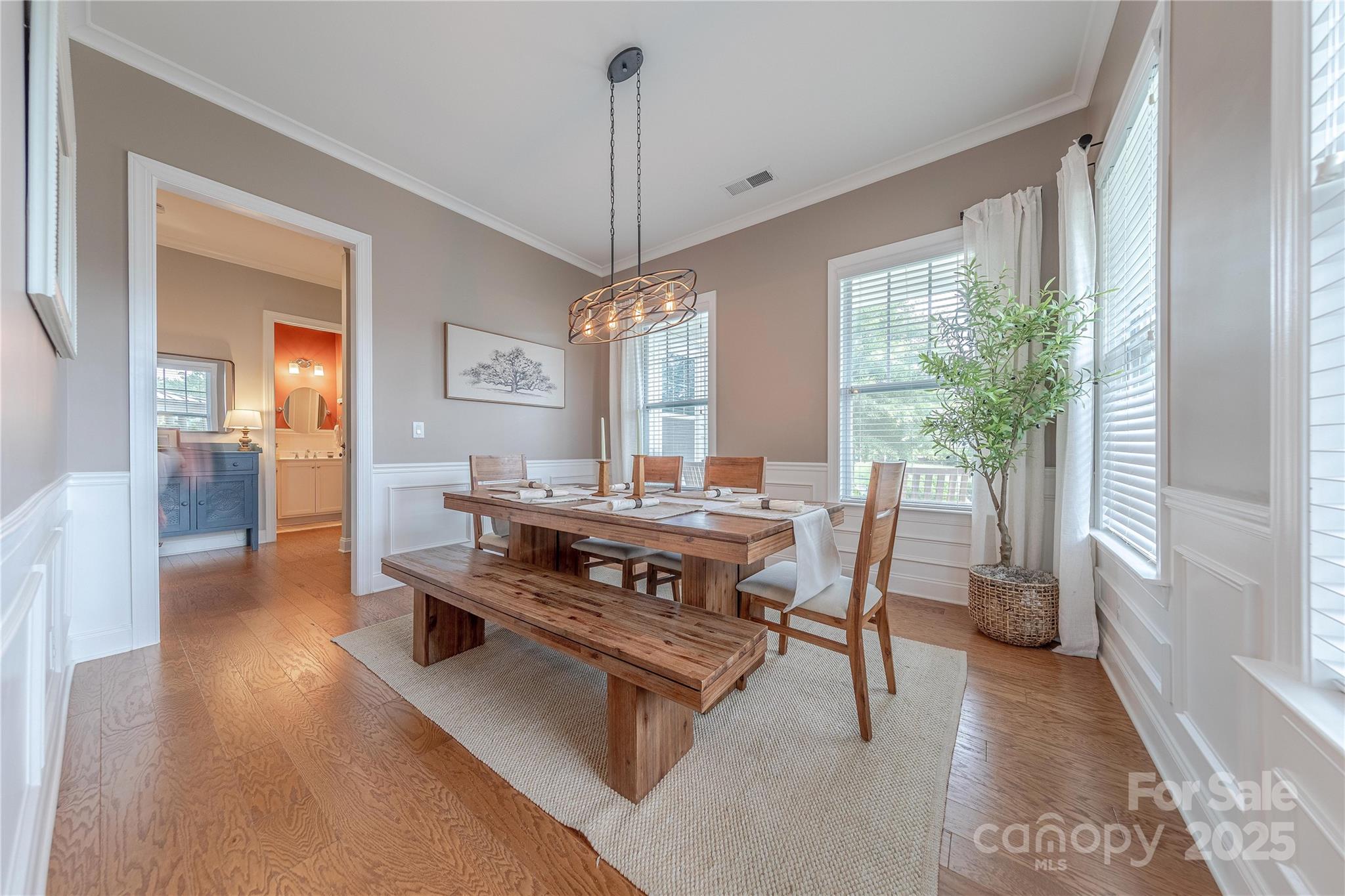 5256 Meadowcroft Way Fort Mill, SC 29708 - Photo 18 of 48 a view of a dining room with furniture window and wooden floor