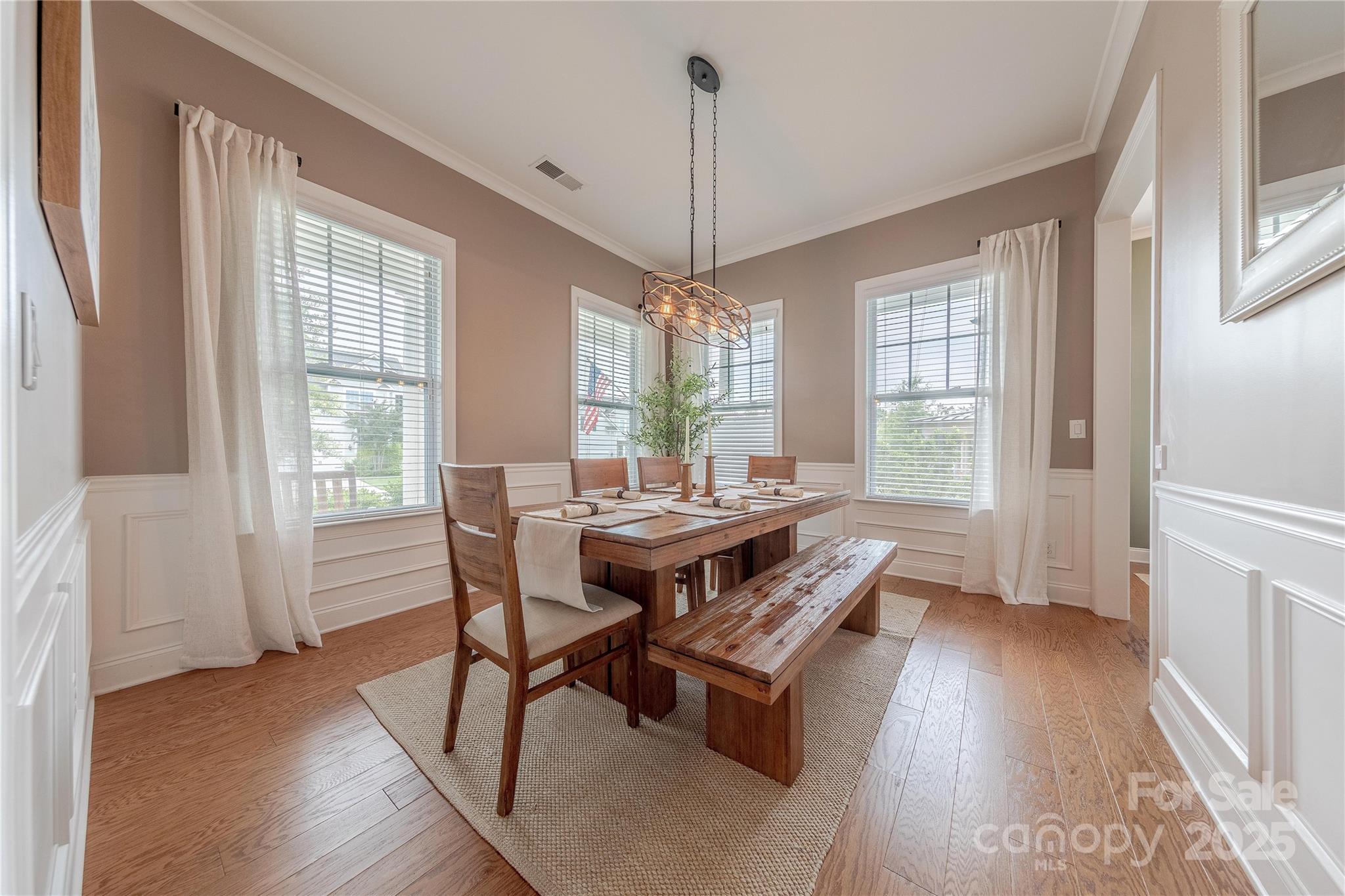 5256 Meadowcroft Way Fort Mill, SC 29708 - Photo 19 of 48 a dining room with furniture window wooden floor