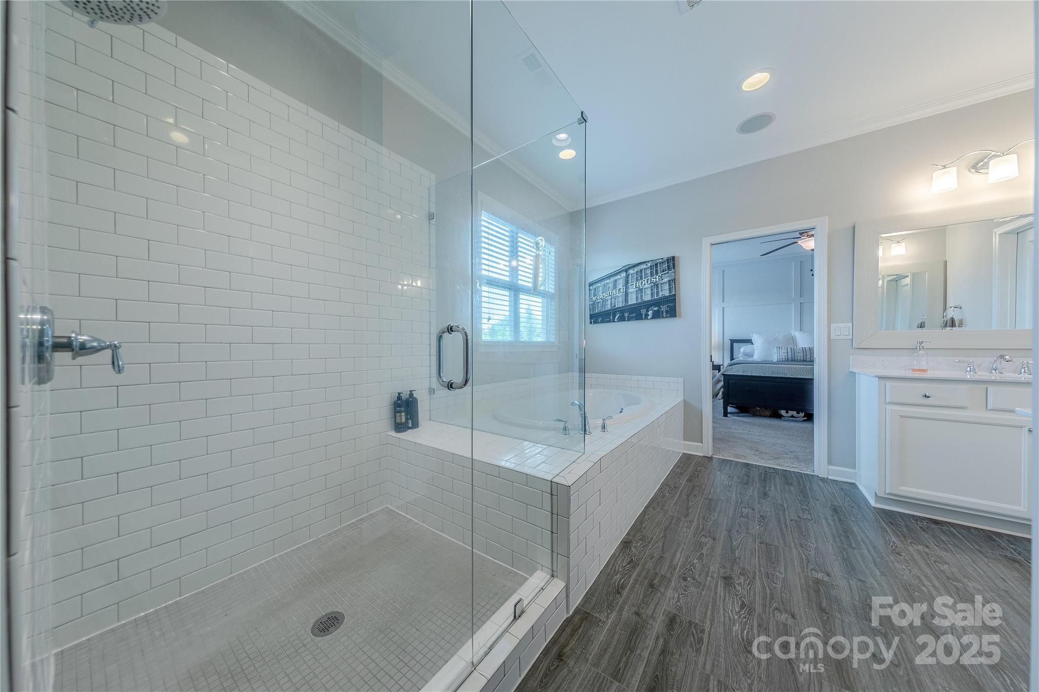 5256 Meadowcroft Way Fort Mill, SC 29708 - Photo 31 of 48 a bathroom with a bathtub and a shower