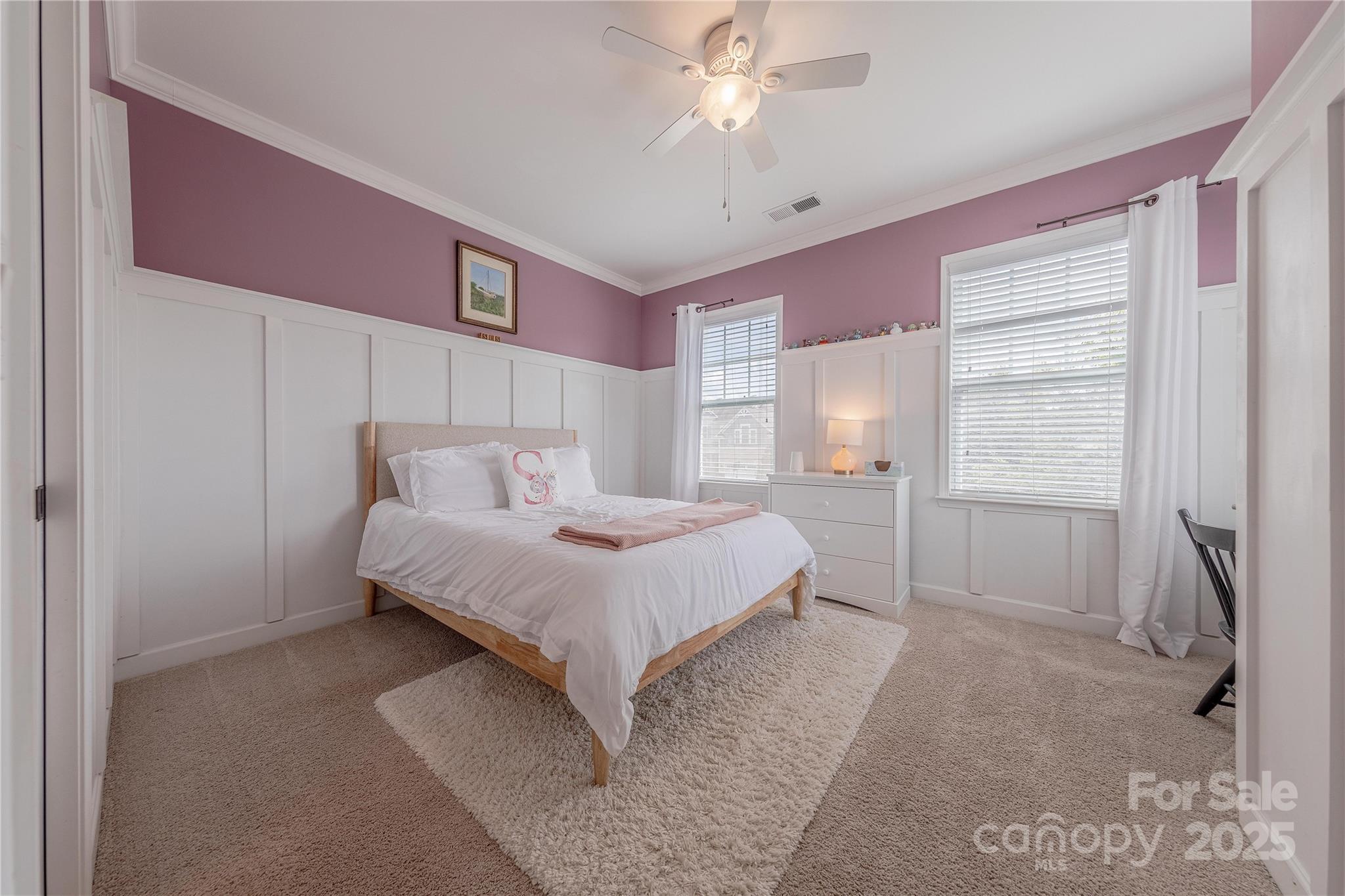 5256 Meadowcroft Way Fort Mill, SC 29708 - Photo 32 of 48 a bedroom with a bed and a cabinets