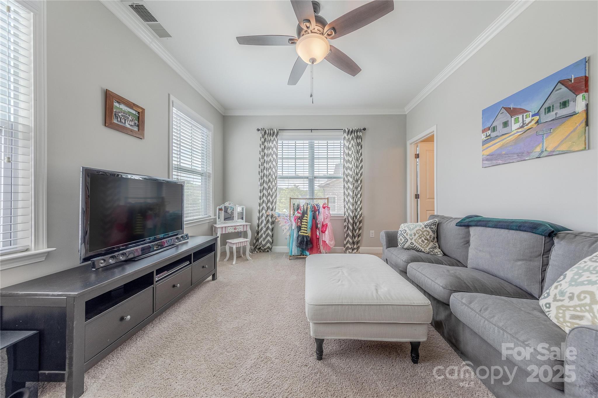 5256 Meadowcroft Way Fort Mill, SC 29708 - Photo 38 of 48 a living room with furniture and a flat screen tv