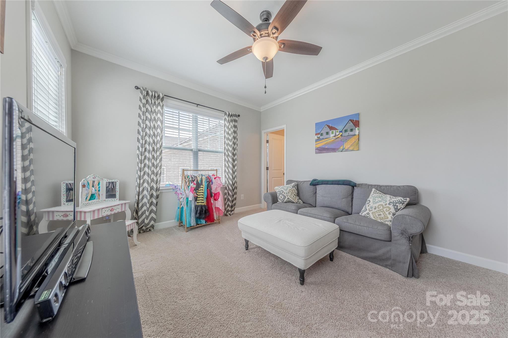 5256 Meadowcroft Way Fort Mill, SC 29708 - Photo 39 of 48 a living room with furniture and a flat screen tv