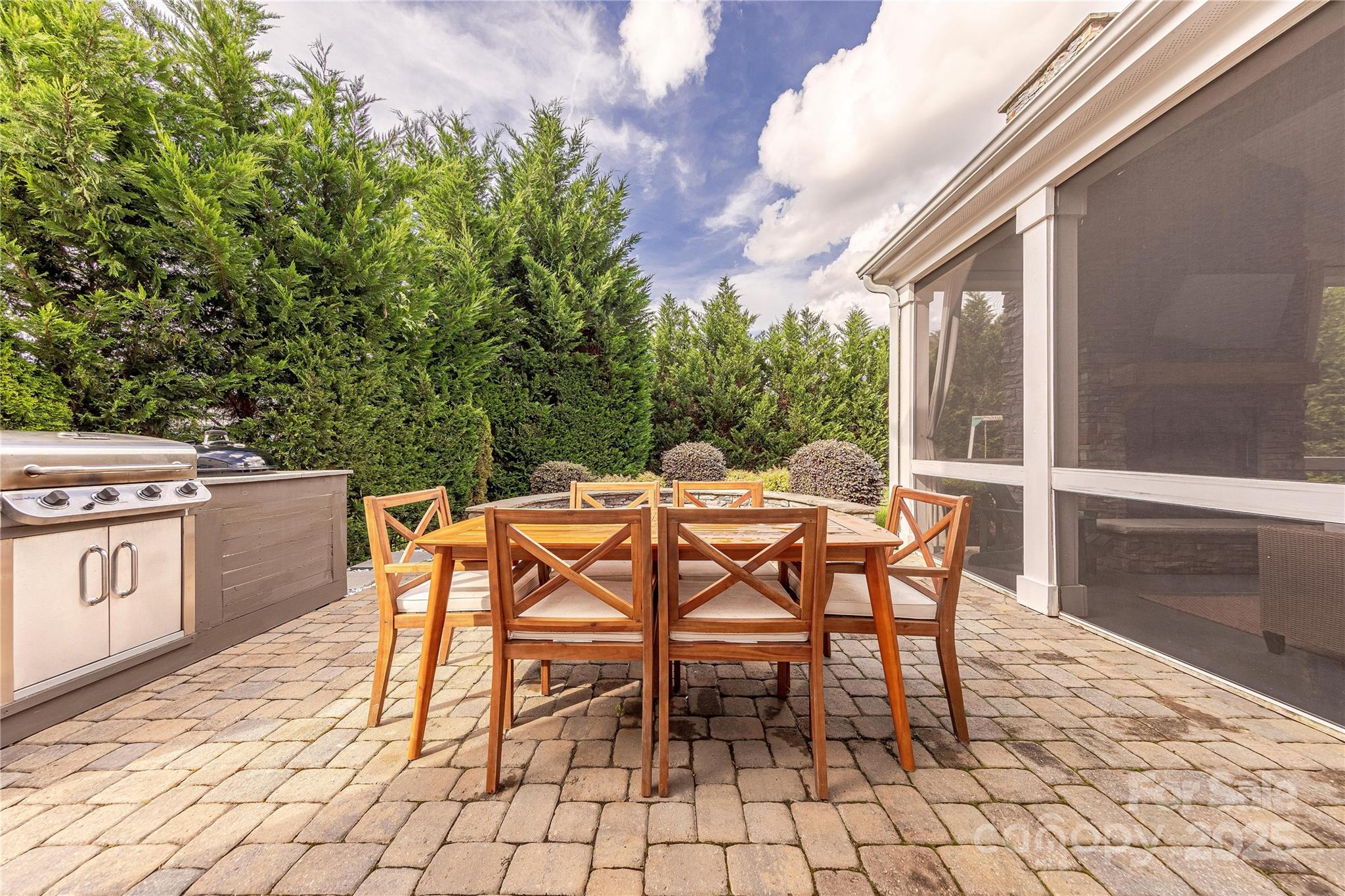 5256 Meadowcroft Way Fort Mill, SC 29708 - Photo 44 of 48 a patio with table and chairs and potted plants