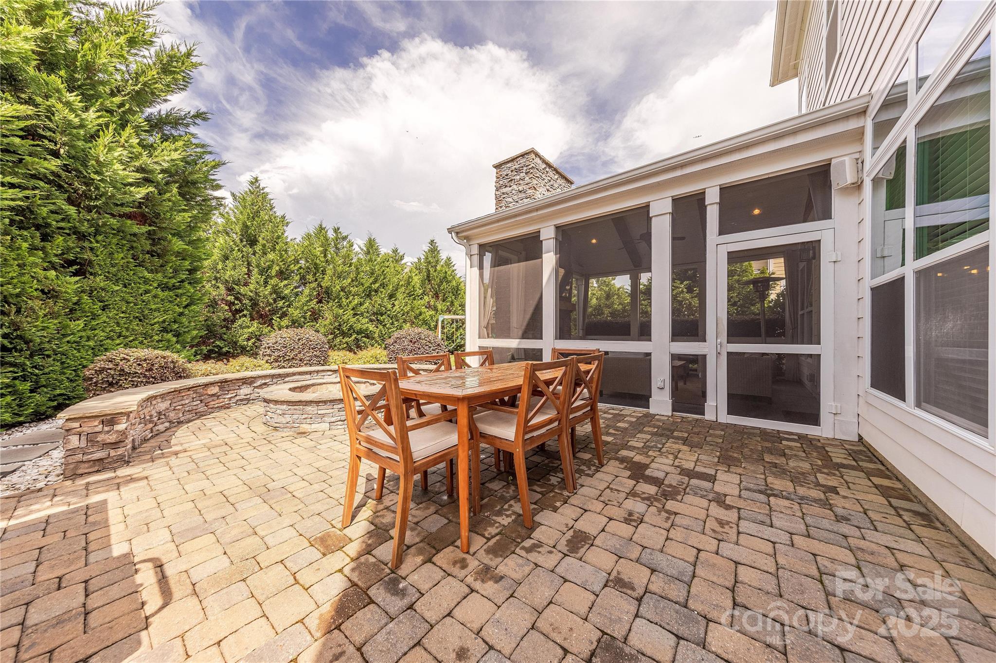 5256 Meadowcroft Way Fort Mill, SC 29708 - Photo 45 of 48 a backyard of a house with table and chairs