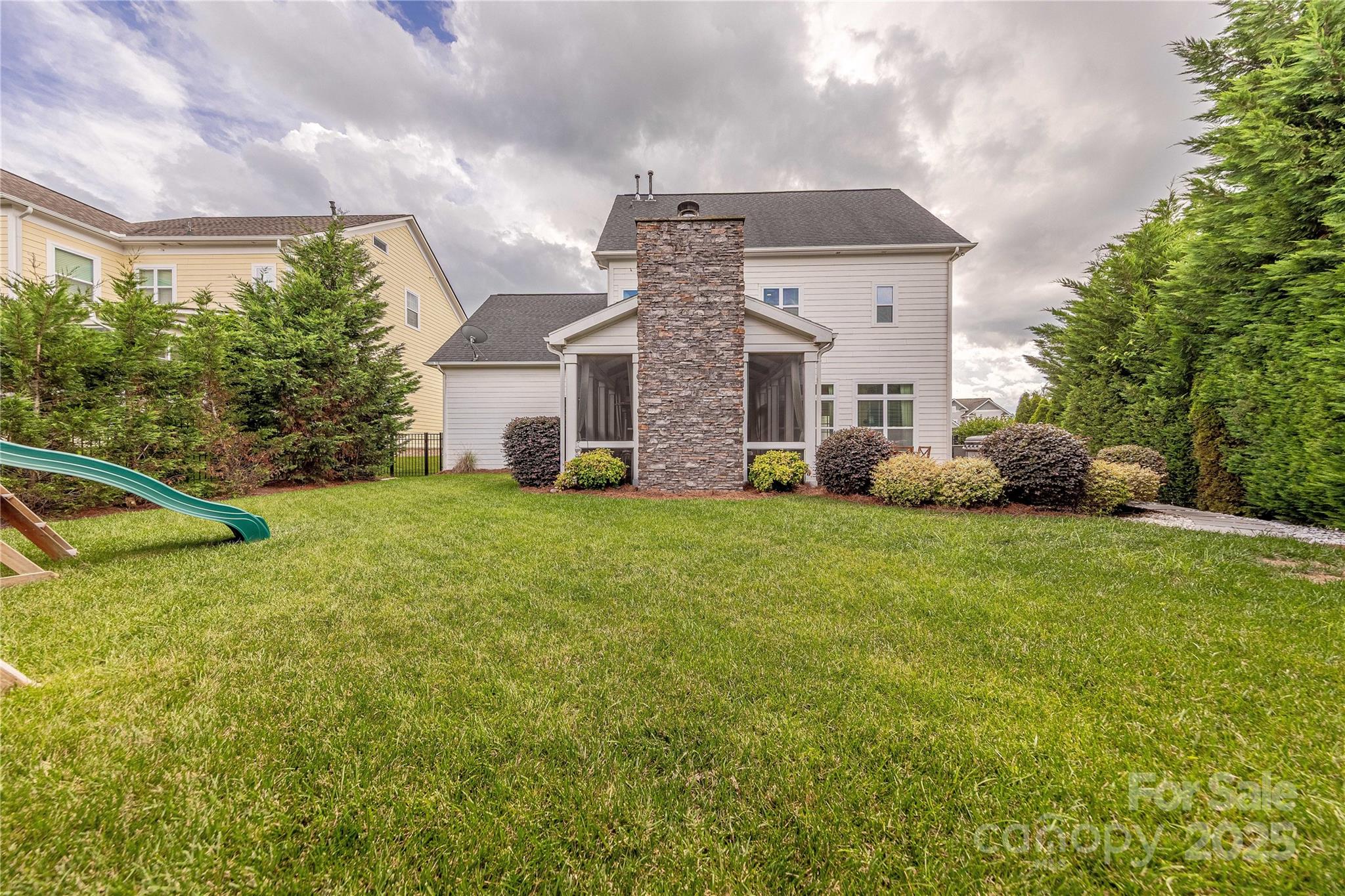5256 Meadowcroft Way Fort Mill, SC 29708 - Photo 47 of 48 a front view of house with yard and green space