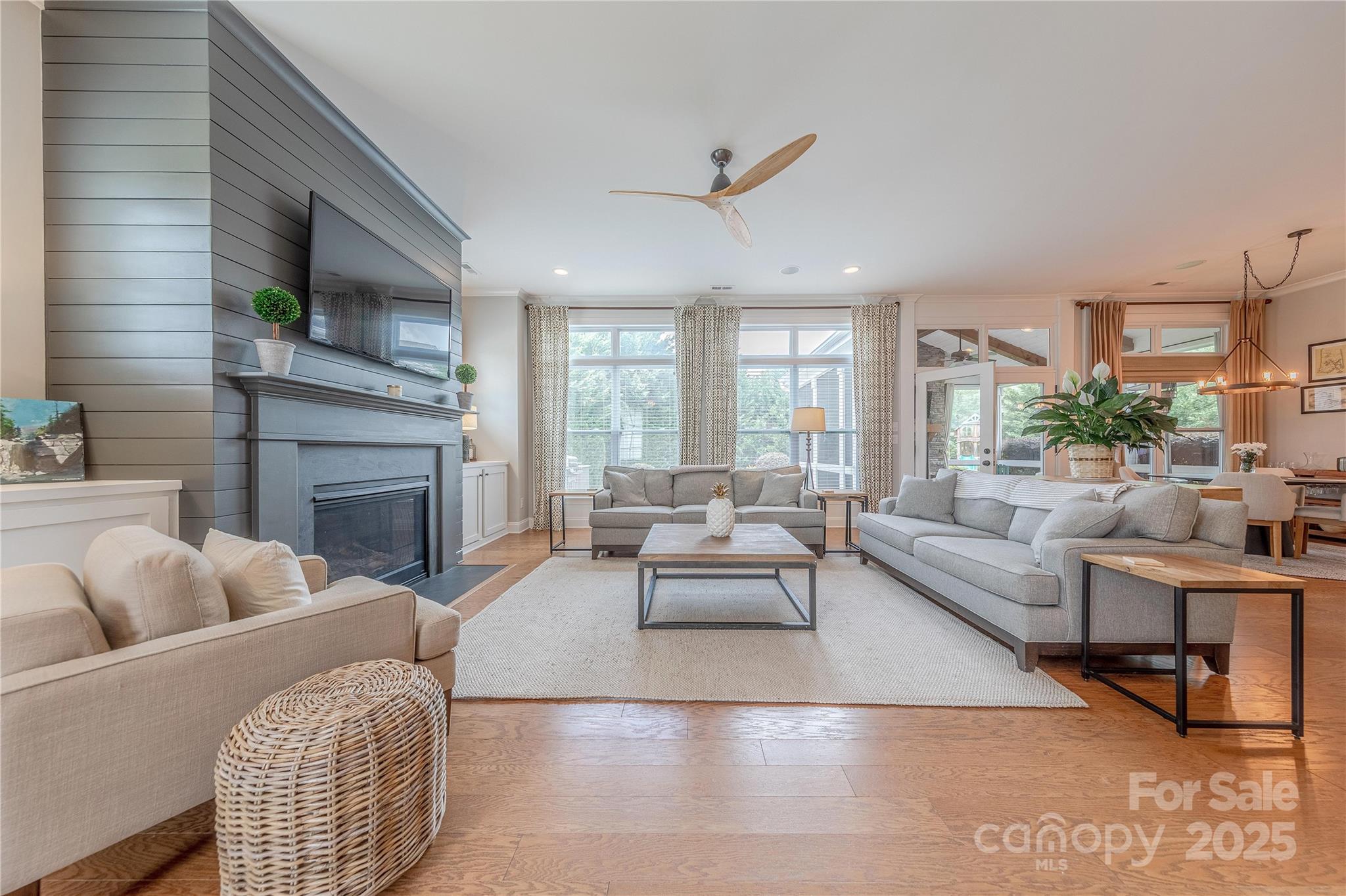 5256 Meadowcroft Way Fort Mill, SC 29708 - Photo 5 of 48 a living room with fireplace furniture and a fireplace