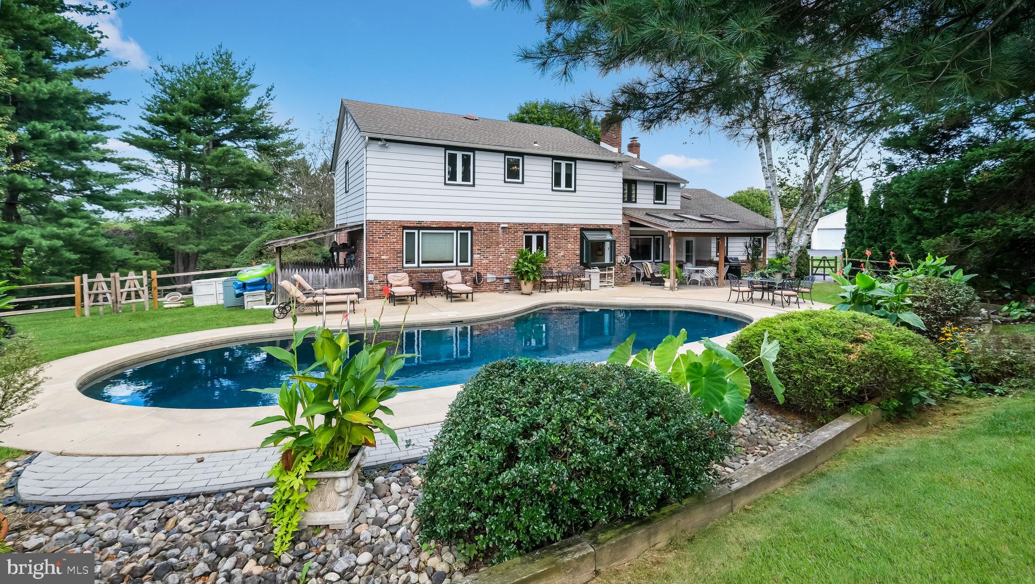 1254 Leedom Road Huntingdon Valley, PA 19006 - Photo 27 of 35 Inground pool with beautiful mature landscaping