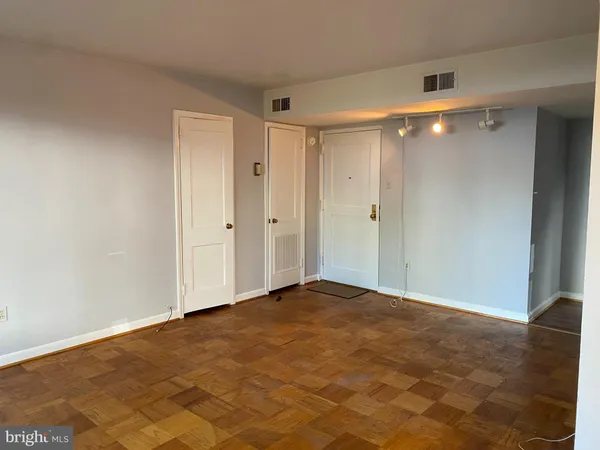 an empty room with windows