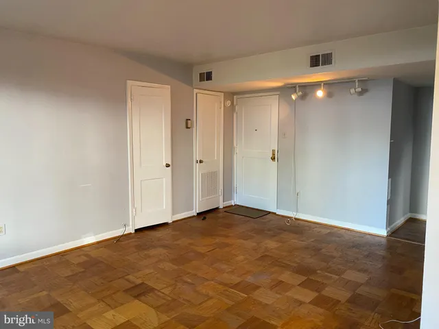 an empty room with windows