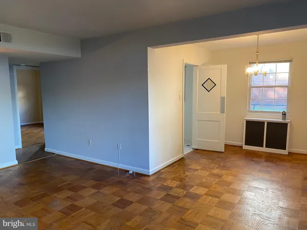 a view of room with window and floor to ceiling window