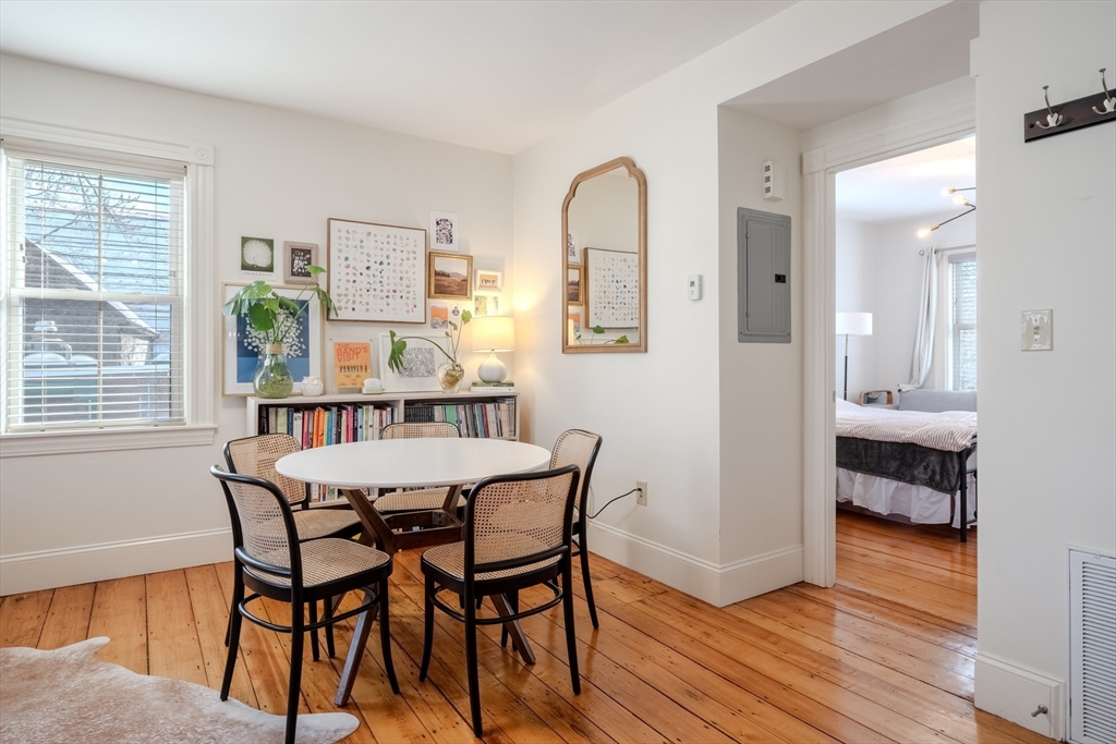 20 Porter Street, Unit 2 Boston, MA 02130 - Photo 11 of 35 a view of a dining room with furniture and wooden floor