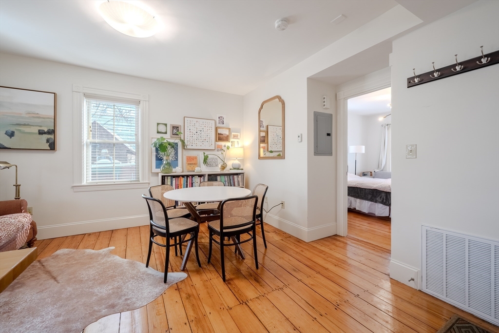 20 Porter Street, Unit 2 Boston, MA 02130 - Photo 12 of 35 a dining room with furniture and wooden floor
