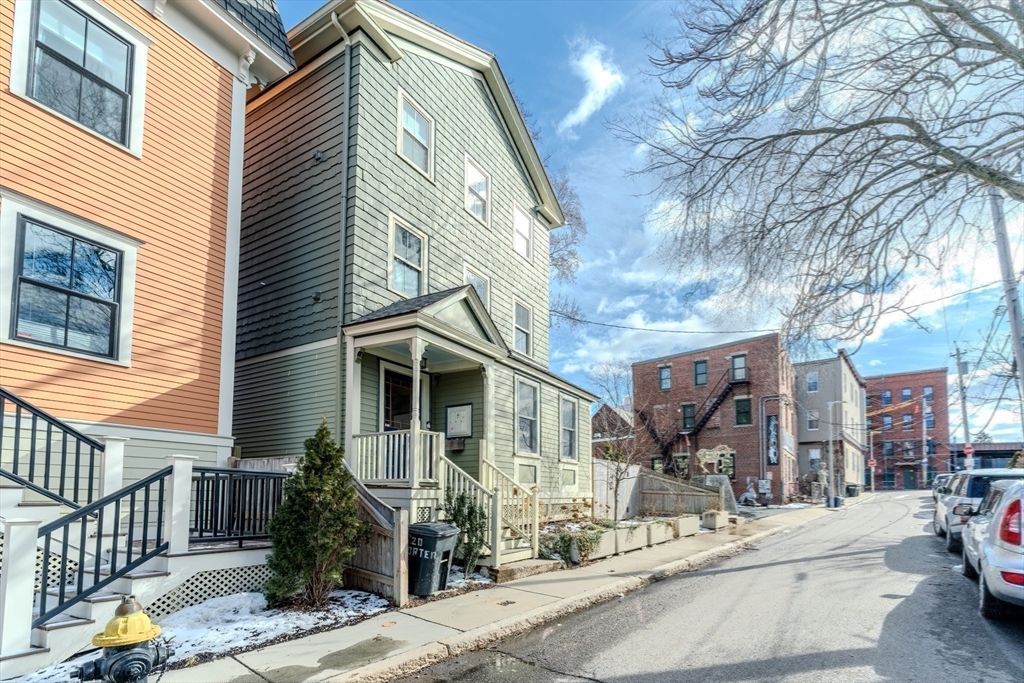 20 Porter Street, Unit 2 Boston, MA 02130 - Photo 19 of 35 a front view of a house with street
