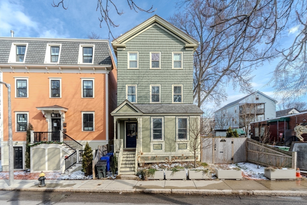 20 Porter Street, Unit 2 Boston, MA 02130 - Photo 20 of 35 a front view of a house with a yard